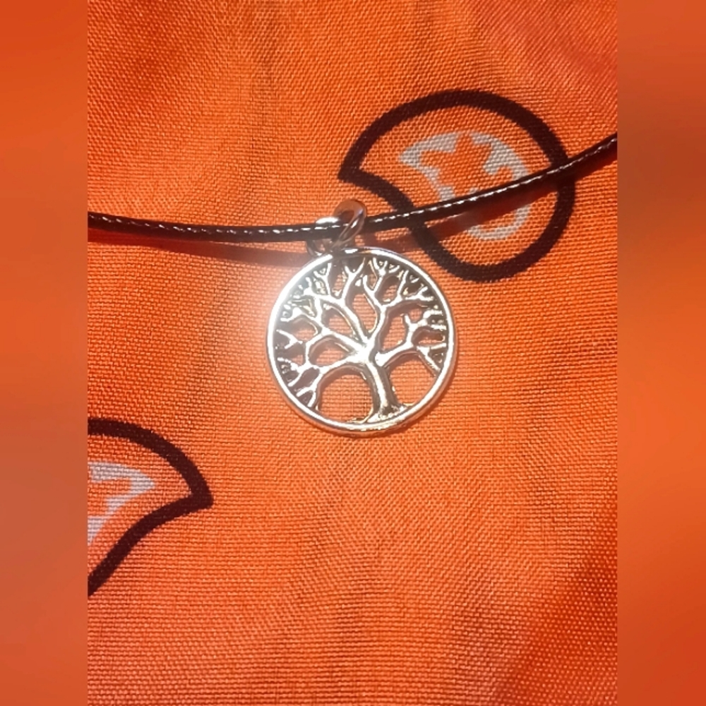 Black cord necklace with tree of life charm